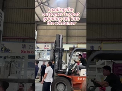 顧客のロボット研削セルをコンテナに積み込む